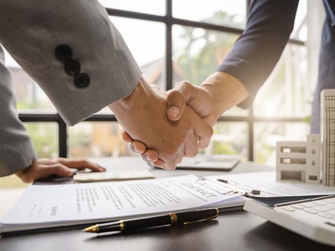 Two people shaking hands